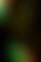 French DJ photographed in dramatic neon light with a double-exposure effect