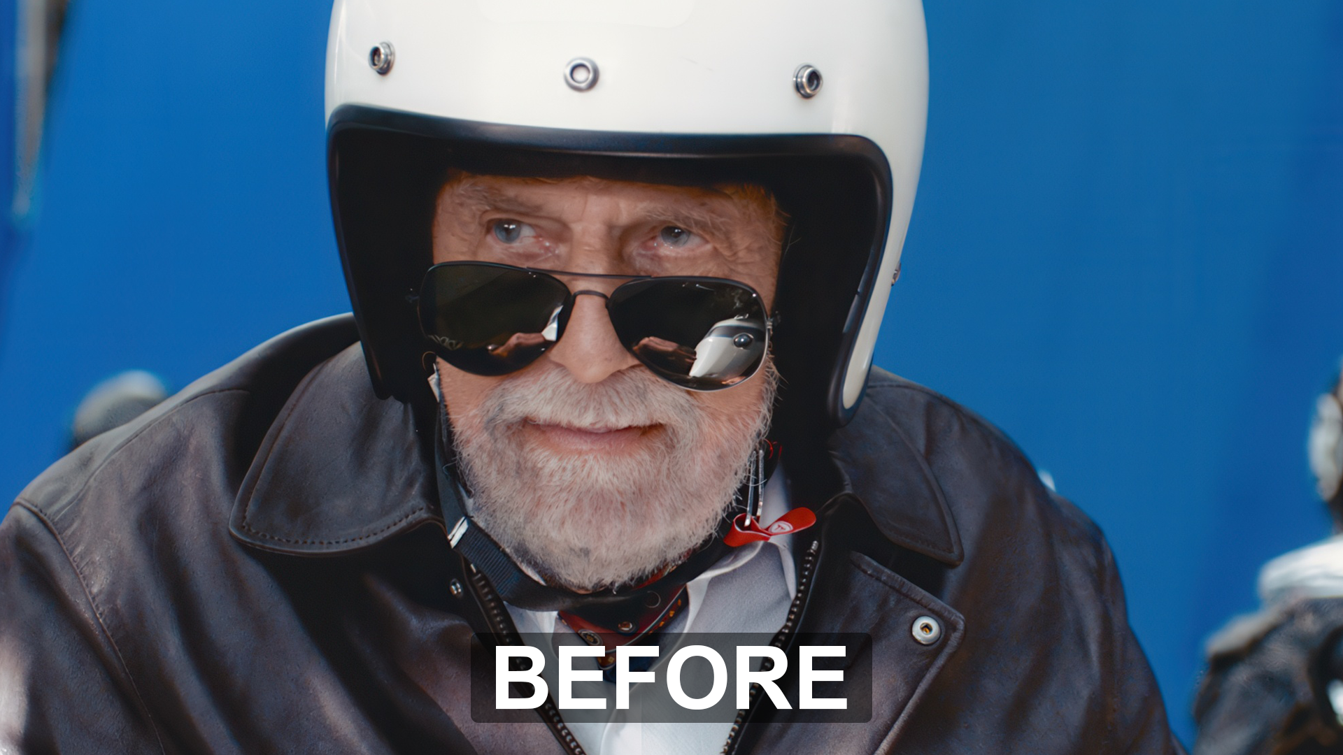 Before de-aging: The Most Interesting Man riding a motorcycle before AI de-aging and visual effects