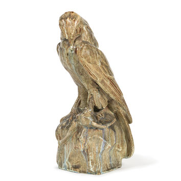 sculpture en grès figurant une buse tenant un oiseau dans ses serres par raymond et alexandre bigot sculpture animalière art nouveau french ceramics