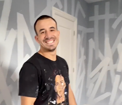 muralist painting a Childs bedroom