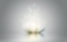 Lotus flower exuding white light and sparkles into the air