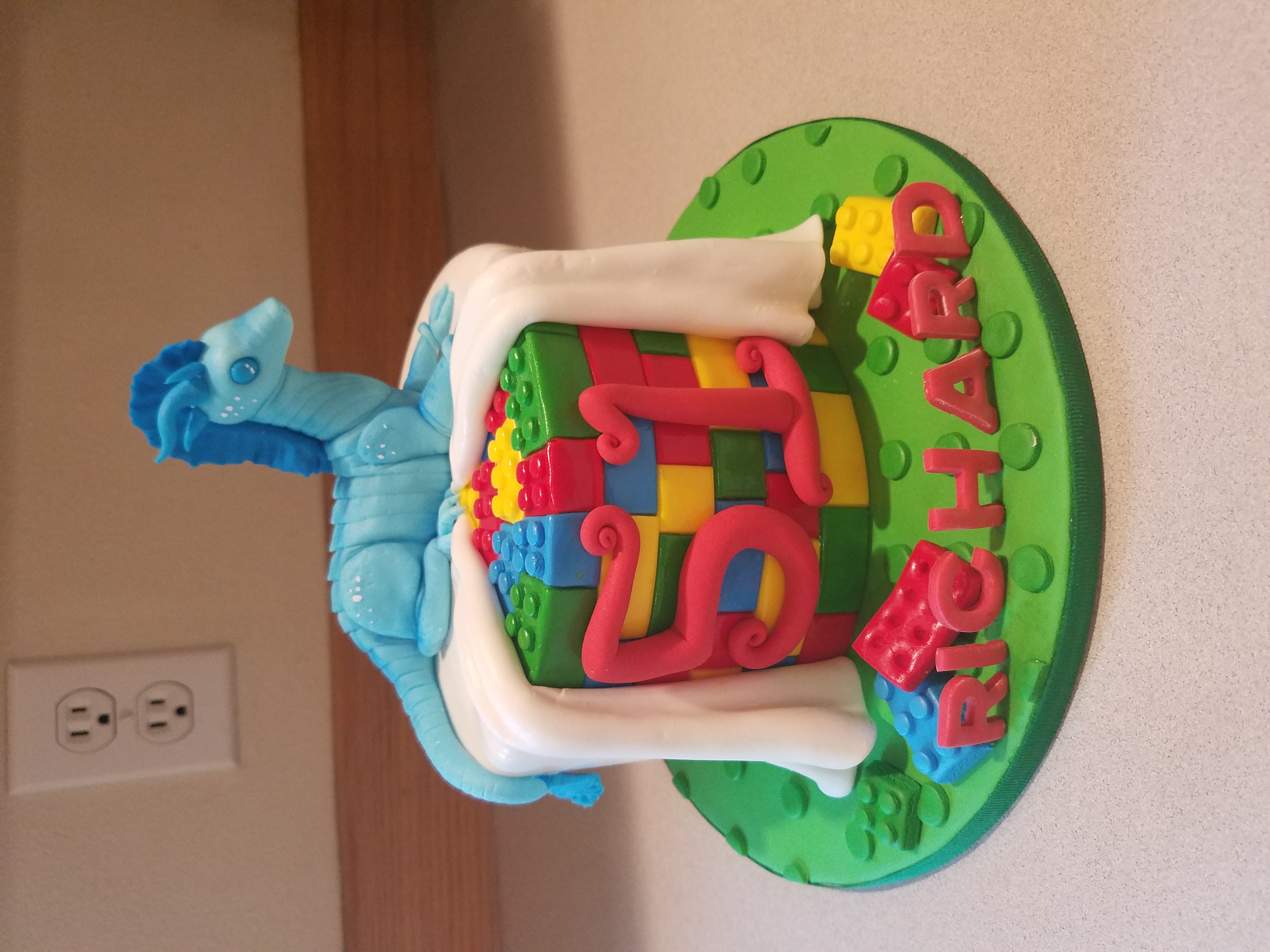 Toy dragon w/lego's cake