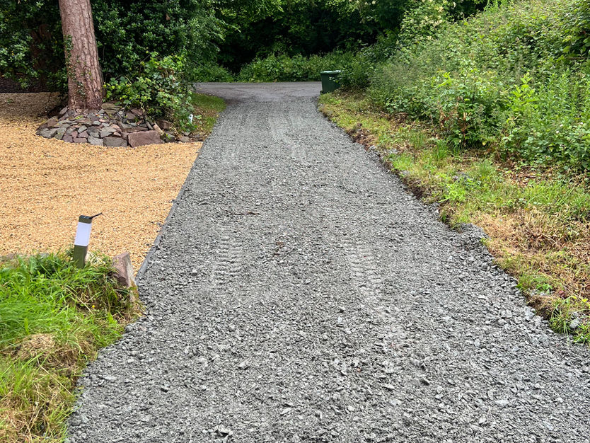 New patch resurfaced with gravel