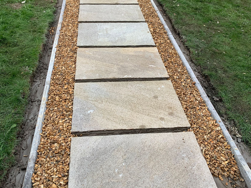 New path created and slabbing leading to property
