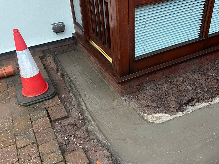 footings dug at domestic property and concrete poured for foundations for an extension. Underground drainage installed.