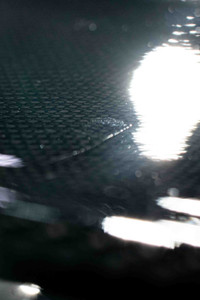 A scratch along the spoiler of a 2014 Nissan GT-R Black Edition.