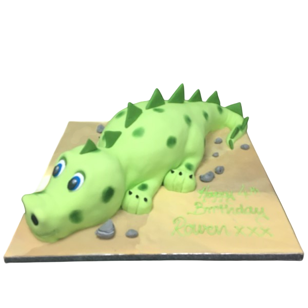 Adorable dinosaur-themed cake with fondant decorations perfect for a dinosaur lover's birthday celebration.