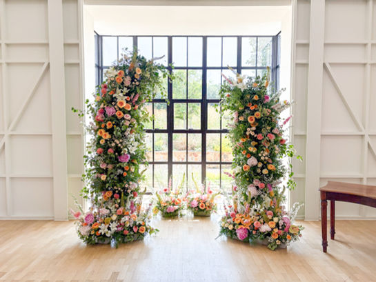 Dramatic floral arch at Limekiln