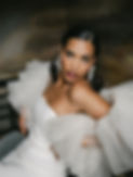 Contemporary bride wearing Halfpenny London gown and pearl earrings
