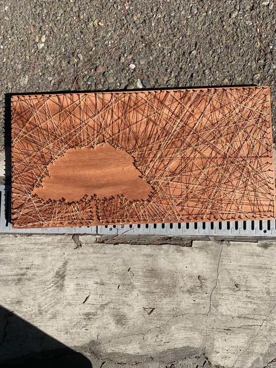 String Art on a Piece of Red Oak