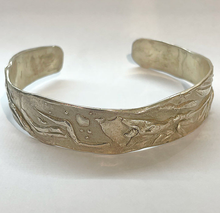 Original handmade sterling silver bracelet; bangle with intricate designs by Merle Bishop New Zealand jewellery artist.