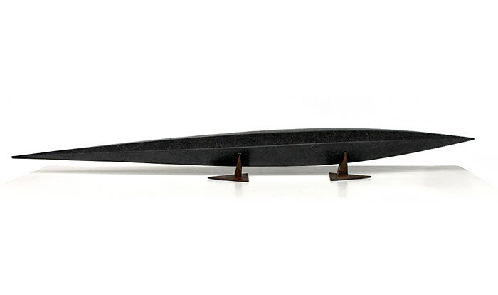 Thumbnail: Beautifully shaped, elegant black granite sculpture on stand. Modern New Zealand interior design sculpture art. Stone carving