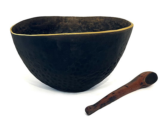 Brass bowl that functions as a gong when hit with the accompanying wooden stick. For yoga and meditation.