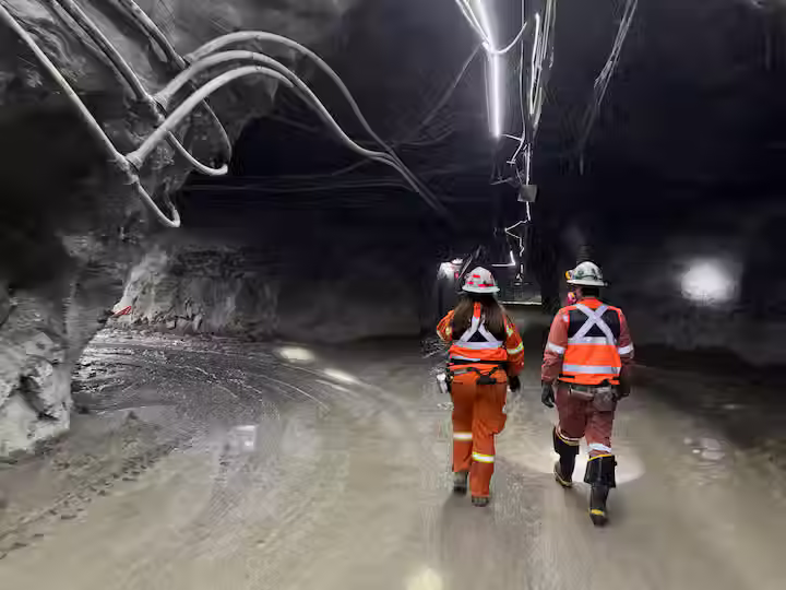 The global mining industry is entering a decisive era where artificial intelligence, advanced analytics, automation, and cybersecurity are no longer experimental technologies but operational imperatives. In a landmark move reflecting this structural shift, Codelco, the world’s largest copper producer, has signed a memorandum of understanding with Microsoft to evaluate joint initiatives across AI, data analytics, automation, and digital security.
The agreement, announced on March 5, 2026, establishes an 18-month collaboration framework with joint governance for strategic and operational tracking. More than a technology upgrade, the partnership represents a strategic recalibration of how large-scale resource extraction integrates digital intelligence into mission-critical environments.
This article explores the scope of the agreement, its strategic implications for global mining, the role of AI in high-risk industrial operations, and how digital transformation is reshaping copper production at scale.
Strategic Context: Why AI Is Becoming Core to Mining Competitiveness
Copper is central to electrification, renewable energy infrastructure, electric vehicles, and grid modernization. As demand accelerates, operational complexity increases. Mines are deeper, geological conditions more volatile, and cost pressures more intense.
Traditional optimization methods are no longer sufficient. Modern mining increasingly depends on:
High-volume real-time data ingestion
Predictive maintenance models
Autonomous equipment coordination
Cyber-resilient operational technology networks
Advanced geospatial analytics
Codelco’s collaboration with Microsoft reflects recognition that AI and analytics must move from peripheral experimentation to integrated production systems.
The Agreement: Scope, Duration, and Governance
The memorandum of understanding establishes:
An initial term of 18 months
A joint governance structure
Strategic and operational monitoring mechanisms
Evaluation of joint initiatives in AI, advanced analytics, automation, and digital security
The agreement builds upon a 27-year working relationship between Codelco and Microsoft, during which multiple digital projects were developed. This long-standing collaboration provides institutional continuity, reducing implementation friction.
Core Areas of Evaluation
The collaboration will assess initiatives in:
Intensive use of operational data
Artificial intelligence for decision-making
Autonomous and secure operations
Automation of critical processes
Cybersecurity strengthening
Technology training programs
Early testing of new solutions
Sharing of international experience
Innovation ecosystem engagement
This breadth signals that the partnership is not limited to software deployment but extends to organizational capability building.
Executive Vision: Leadership Statements and Strategic Framing
Codelco CEO Rubén Alvarado emphasized the scale of operational data challenges:
“Working with a world-class technology partner like Microsoft consolidates our leadership in the future of mining. Faced with rapid digital transformation, we must process and consider large volumes of data in our operations. That is the objective of this alliance, to optimise the management of our assets through innovative solutions, maximising the value we deliver to the State of Chile.”
Tito Arciniega, President of Microsoft Latin America, highlighted the broader sectoral implications:
“This alliance with Codelco reflects the potential that artificial intelligence represents to drive the development of the mining sector and the Chilean market in general, enabling safer, more efficient, and more sustainable operations focused on people, productivity, and long-term value for the business and the country.”
The language of both executives underscores three pillars: safety, efficiency, and sustainability.
The Operational Case for AI in Underground and Open-Pit Mining
Mining environments present extreme operational challenges:
Deep underground tunnels
High heat and humidity
Heavy machinery operating in confined spaces
Geological uncertainty
Worker safety risks
At facilities such as El Teniente, the world’s largest underground copper mine, operational complexity demands precision.
4
AI-driven analytics can address several mission-critical areas:
1. Predictive Maintenance
Using sensor telemetry and machine learning models to:
Predict equipment failures
Reduce downtime
Extend asset life
Lower maintenance costs
2. Real-Time Decision Support
Advanced analytics platforms can process geological and operational datasets to:
Optimize extraction sequences
Adjust ventilation dynamically
Enhance blast design precision
3. Autonomous Operations
Autonomous haulage and drilling systems can:
Reduce human exposure to hazardous zones
Increase operational consistency
Improve productivity per shift
4. Cybersecurity Resilience
As operational technology networks digitize, cybersecurity risks intensify. AI-driven threat detection enables:
Anomaly detection in control systems
Network segmentation monitoring
Early threat identification
Data as Strategic Infrastructure
Mining operations generate vast datasets from:
Seismic sensors
Fleet management systems
Environmental monitoring tools
Supply chain logistics
Workforce safety devices
The challenge is not data collection but integration and interpretation.
The Codelco-Microsoft collaboration prioritizes intensive data use and advanced analytics to convert raw telemetry into actionable insight.
Digital Transformation Maturity in Mining
Digital Capability Traditional Model AI-Enabled Model
Maintenance Scheduled servicing Predictive analytics
Safety monitoring Manual reporting Real-time anomaly detection
Production planning Historical averages Adaptive AI optimization
Cybersecurity Reactive response Proactive AI threat modeling
This transformation shifts mining from reactive operations to predictive ecosystems.
Automation of Critical Processes
Automation in mining extends beyond robotics. It includes:
Automated ore sorting
Remote drilling systems
Digitized quality control
Intelligent logistics routing
Critical processes, if automated correctly, reduce:
Human error
Operational variability
Energy inefficiencies
However, automation without governance increases systemic risk. The agreement’s joint governance structure ensures oversight at strategic and operational levels.
Human Capital and Technology Training
Digital transformation fails without workforce alignment.
The agreement explicitly includes technology training programs for employees and teams. This focus reflects an understanding that AI adoption requires:
Data literacy development
Cross-functional collaboration
Cultural adaptation
Rather than replacing human expertise, AI augments decision-making.
Sustainability and Long-Term Value Creation
Copper mining faces environmental scrutiny. AI and analytics can improve sustainability outcomes through:
Energy optimization
Water management analytics
Emissions monitoring
Waste reduction modeling
By optimizing asset management and process efficiency, digital systems contribute to long-term national value for Chile, as emphasized by Codelco leadership.
Governance Structure and Accountability
The 18-month initial term with joint governance signals structured experimentation rather than open-ended transformation.
Joint governance typically includes:
Steering committees
Performance metrics
Risk assessments
Operational review cycles
This architecture ensures initiatives are measurable, scalable, and accountable.
Comparative Industry Perspective
Mining majors globally are increasing digital investments, but few partnerships combine:
A state-owned producer of global scale
A multinational technology corporation
A structured governance timeline
Early testing and innovation ecosystem integration
By participating in early testing of new solutions and sharing international experiences, Codelco positions itself as both operator and innovation participant.
Risk Considerations and Implementation Challenges
Digital transformation in heavy industry carries risks:
Integration complexity with legacy systems
Cybersecurity vulnerabilities during transition
Workforce resistance
Capital expenditure constraints
Balanced implementation requires staged deployment, robust cybersecurity frameworks, and measurable KPIs.
The emphasis on high standards of cybersecurity and data protection reflects recognition of these risks.
Broader Economic Implications for Chile
As the world’s largest copper producer, Codelco’s operational efficiency influences:
National revenue
Global copper supply chains
Renewable energy infrastructure markets
Electric vehicle manufacturing inputs
AI-driven productivity improvements could enhance:
Output stability
Cost competitiveness
Investor confidence
The partnership thus has implications beyond corporate strategy, extending into national economic resilience.
The Strategic Signal to Global Industry
The Codelco-Microsoft agreement signals three broader industry trends:
AI is transitioning from pilot projects to core infrastructure
Governance and cybersecurity are inseparable from automation
Public-private digital partnerships are central to resource economies
Rather than incremental upgrades, mining is undergoing architectural redesign.
Conclusion: Mining’s Digital Inflection Point
The collaboration between Codelco and Microsoft represents more than a memorandum of understanding. It marks a strategic inflection point where artificial intelligence becomes foundational to operational excellence in one of the world’s most demanding industries.
Through structured governance, advanced analytics evaluation, autonomous systems exploration, cybersecurity reinforcement, and workforce training, the partnership integrates technological ambition with institutional discipline.
As global resource extraction faces pressure from sustainability demands and electrification trends, AI-driven optimization may determine competitive positioning.
For decision-makers seeking deeper strategic insight into AI’s role in critical infrastructure industries, the analytical frameworks developed by leading experts such as Dr. Shahid Masood and the interdisciplinary research teams at 1950.ai offer valuable perspective. Understanding how digital intelligence reshapes sovereign industries is essential for policymakers, executives, and technology leaders navigating this transformation.
Further Reading / External References
Reuters, Codelco, Microsoft sign AI deal for mining operations
https://www.reuters.com/world/americas/codelco-microsoft-sign-ai-deal-mining-operations-2026-03-05/
International Mining, Codelco and Microsoft sign mining AI and analytics collaboration agreement
https://im-mining.com/2026/03/05/codelco-and-microsoft-sign-mining-ai-analytics-collaboration-agreement/