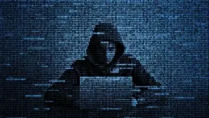 Modern cyberattacks are increasingly shifting away from exploiting technical vulnerabilities alone and toward manipulating human trust. Rather than spending weeks searching for software flaws, attackers are finding success by impersonating trusted colleagues, IT administrators, and helpdesk personnel. This evolution reflects a broader transformation in cybercrime, where social engineering has become one of the most effective methods for gaining initial access to corporate environments.
A recently observed campaign targeting Microsoft Teams illustrates this trend with remarkable sophistication. Instead of relying solely on phishing emails, attackers combine email lures, voice calls, legitimate remote administration software, and advanced malware to convince employees to voluntarily grant remote access to their own systems. Once inside, the attackers deploy EtherRAT, a cross-platform remote access trojan capable of establishing persistent control over compromised devices.
The campaign demonstrates how collaboration platforms, which have become indispensable for modern businesses, are increasingly serving as attractive targets for cybercriminals seeking to bypass traditional security controls.
The Evolution of Social Engineering
Cybersecurity has long emphasized protecting systems through firewalls, endpoint protection, encryption, and vulnerability management. While these defenses remain essential, attackers increasingly recognize that people often represent the most accessible entry point.
Traditional phishing campaigns relied heavily on deceptive emails containing malicious links or attachments. Today's attacks are considerably more interactive.
Modern social engineering frequently includes:
Voice calls
Video meetings
Instant messaging
Collaboration platforms
SMS messages
Multi-stage communication
Real-time technical assistance
By engaging victims directly, attackers create an illusion of legitimacy that static phishing emails often fail to achieve.
Why Microsoft Teams Has Become an Attractive Target
Enterprise collaboration platforms now serve as central communication hubs for organizations worldwide.
Employees routinely use Microsoft Teams for:
Internal messaging
Helpdesk support
File sharing
Screen sharing
Remote troubleshooting
Project collaboration
Voice and video calls
Because employees regularly receive technical assistance through these channels, attackers can imitate familiar workflows with relatively little effort.
Rather than introducing an unfamiliar communication method, cybercriminals exploit an environment employees already trust.
Anatomy of the Attack
The observed campaign follows a carefully orchestrated sequence designed to lower suspicion at each stage.
Typical Attack Flow
Phase Attacker Activity
Initial contact Phishing email disguised as an employee survey
Social engineering Microsoft Teams voice call impersonating IT support
Trust building Request for remote troubleshooting
Remote access Installation of legitimate administration software
Malware delivery Execution of malicious installer
Persistence Deployment of EtherRAT
Each step appears reasonable when viewed independently.
Combined, they create an effective pathway from initial contact to complete system compromise.
Why Legitimate Remote Administration Tools Are Effective
One notable characteristic of the campaign is its reliance on legitimate remote management applications.
Instead of exploiting software vulnerabilities to gain remote access, attackers persuade users to install trusted administrative tools commonly used for technical support.
Examples include:
AnyDesk
HopToDesk
Other enterprise remote assistance platforms
These applications are legitimate business software.
However, when installed under false pretenses, they provide attackers with capabilities similar to those of an internal IT administrator.
Because these tools are widely trusted and digitally signed, they may initially attract less scrutiny than traditional malware.
Understanding EtherRAT
After remote access is established, attackers deploy EtherRAT.
EtherRAT belongs to the category of Remote Access Trojans (RATs), malicious software designed to provide persistent control over compromised systems.
Reported capabilities include:
Remote command execution
File management
Data theft
Long-term persistence
Cross-platform operation
System monitoring
Remote administration
Unlike malware limited to a single operating system, EtherRAT is designed using Node.js, allowing it to function across Windows, Linux, and macOS environments.
This flexibility increases its usefulness for attackers targeting organizations with diverse IT infrastructures.
Why Command-and-Control Infrastructure Is Evolving
One particularly notable aspect of EtherRAT is its command-and-control architecture.
Rather than relying exclusively on fixed infrastructure, the malware can retrieve active command-and-control information through Ethereum smart contracts.
This introduces several operational advantages for attackers.
Traditional Infrastructure
Static domains
Dedicated servers
Easier disruption
Faster blacklist generation
Blockchain-Assisted Infrastructure
Decentralized information retrieval
More resilient infrastructure
Greater operational flexibility
Increased difficulty for defenders attempting disruption
Although blockchain technology offers numerous legitimate applications, this campaign demonstrates how emerging technologies can also be adapted for malicious purposes.
Human Psychology Remains the Primary Attack Surface
Technology alone cannot explain the effectiveness of these attacks.
Their success depends primarily upon exploiting human behavior.
Attackers leverage several psychological principles simultaneously.
Authority
Victims are more likely to comply with requests appearing to originate from IT administrators.
Urgency
Unexpected technical problems encourage rapid decision-making.
Familiarity
Microsoft Teams has become an established workplace communication platform.
Reciprocity
Employees often wish to cooperate with colleagues attempting to resolve technical issues.
Routine
Remote troubleshooting has become common in distributed workplaces.
When combined, these factors significantly reduce skepticism during live interactions.
Security Features Help, But Cannot Replace User Awareness
Collaboration platforms increasingly include security mechanisms designed to identify potentially suspicious communications.
Examples include:
External participant labels
Unknown contact warnings
Administrative controls
Meeting access restrictions
Bot approval policies
Audit logging
These protections provide valuable context.
However, they cannot prevent employees from voluntarily granting remote access if users ignore or misunderstand warning indicators.
Security technology remains most effective when combined with informed user behavior.
Detecting Remote Control Abuse
Organizations should recognize that remote administration sessions leave valuable forensic evidence.
Potential indicators may include:
Remote control session artifacts
Unexpected installation of remote administration software
External Microsoft Teams communications
Unusual process execution
Unexpected Node.js runtime installation
Suspicious MSI installer activity
Abnormal outbound network traffic
Security Operations Centers increasingly rely on behavioral analytics to identify suspicious activity that traditional signature-based detection may overlook.
Enterprise Defense Requires Multiple Layers
No single security control can eliminate social engineering attacks.
Effective defense requires overlapping protective measures.
Technical Controls
Endpoint detection and response
Multi-factor authentication
Email filtering
Application allowlisting
Privileged access management
Network segmentation
Security monitoring
Human Controls
Security awareness training
Simulated phishing exercises
Verification procedures
Incident reporting culture
Helpdesk authentication protocols
Organizations that combine technical and human-centered defenses generally demonstrate stronger resilience against modern attack campaigns.
Zero Trust Strengthens Organizational Security
The growing sophistication of identity-based attacks reinforces the importance of Zero Trust security principles.
Rather than automatically trusting users because they have successfully authenticated, Zero Trust continuously evaluates:
User identity
Device health
Access location
Behavioral patterns
Risk signals
Requested resources
This approach reduces opportunities for attackers to expand their access after compromising a single endpoint.
Remote Work Has Expanded the Attack Surface
Hybrid work environments have fundamentally changed enterprise security.
Employees now communicate across multiple locations using cloud-based collaboration tools throughout the workday.
While these technologies improve productivity, they also expand opportunities for impersonation.
Attackers no longer need physical access to corporate offices.
Instead, they can initiate convincing conversations from virtually anywhere while appearing to operate as legitimate internal personnel.
Practical Recommendations for Organizations
Organizations can significantly reduce exposure by implementing several practical measures.
Employee Best Practices
Verify unexpected IT requests through independent communication channels.
Treat unsolicited Microsoft Teams calls with caution.
Never install software solely based on instructions received during unexpected calls.
Confirm the identity of helpdesk personnel before granting remote access.
Report suspicious communications immediately.
IT and Security Teams
Security Area Recommended Action
Identity verification Establish formal authentication procedures for IT support
Remote administration Restrict approved remote access software
Endpoint protection Monitor unauthorized software installation
Teams administration Review external communication policies
Security awareness Conduct regular social engineering training
Incident response Monitor audit logs for abnormal collaboration activity
The Future of Collaboration Platform Security
As enterprise collaboration platforms continue evolving, attackers will likely develop increasingly sophisticated impersonation techniques.
Artificial intelligence may eventually enable:
Highly convincing voice impersonation
Automated phishing conversations
Personalized social engineering
Real-time multilingual attacks
Context-aware deception
In response, organizations will increasingly rely upon:
Behavioral analytics
AI-powered threat detection
Identity verification technologies
Adaptive authentication
Stronger user education
The competition between offensive social engineering and defensive identity protection is likely to become one of cybersecurity's defining challenges over the coming decade.
Conclusion
The emergence of fake IT support campaigns targeting Microsoft Teams highlights how enterprise cyber threats are increasingly focused on exploiting trust rather than technical weaknesses. By combining phishing emails, live voice conversations, legitimate remote administration software, and sophisticated malware such as EtherRAT, attackers are demonstrating that successful compromises often begin with convincing human interaction rather than advanced software exploits.
For organizations, the lesson is clear. Cybersecurity must extend beyond technical infrastructure to include user awareness, identity verification, layered defenses, and continuous monitoring of collaboration platforms. As digital workplaces become more interconnected, protecting employees from impersonation-based attacks will be just as important as protecting servers and networks from traditional malware.
For cybersecurity researchers and technology strategists, including Dr. Shahid Masood and the expert team at 1950.ai, campaigns like this reinforce an important reality. The future of enterprise security will increasingly depend on combining intelligent threat detection with resilient human-centered security practices that can recognize deception before it becomes a full-scale system compromise.
Further Reading / External References
Fake IT bods on Microsoft Teams coax workers into installing malware
https://www.theregister.com/cyber-crime/2026/07/07/fake-it-bods-on-microsoft-teams-coax-workers-into-installing-malware/5267610
Fake IT Support Calls on Microsoft Teams Open Door to Full System Takeover
https://the420.in/fake-microsoft-teams-it-support-calls-etherrat-malware/
Fake IT support calls on Microsoft Teams push EtherRAT malware
https://www.bleepingcomputer.com/news/security/fake-it-support-calls-on-microsoft-teams-push-etherrat-malware/