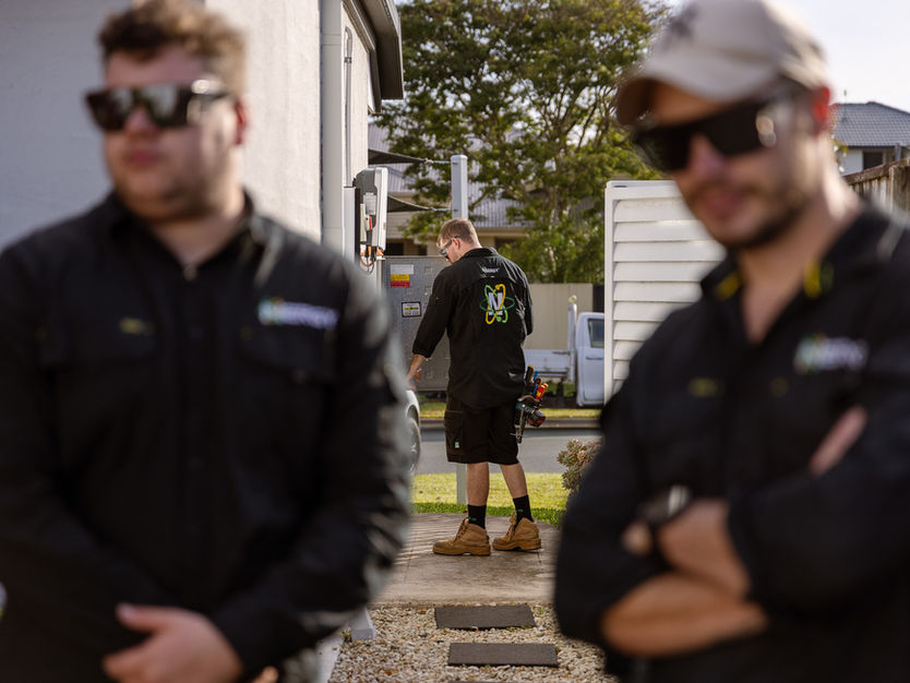 Nergy electrical and solar installation team on-site at a residential project in Southeast Queensland.
