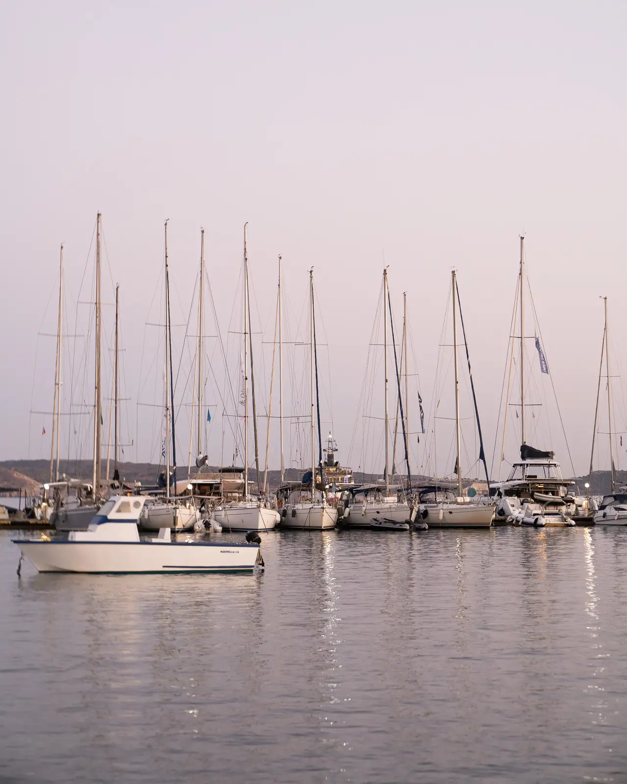 Yachts and boats in the port of Adamantas, Milos - Greece