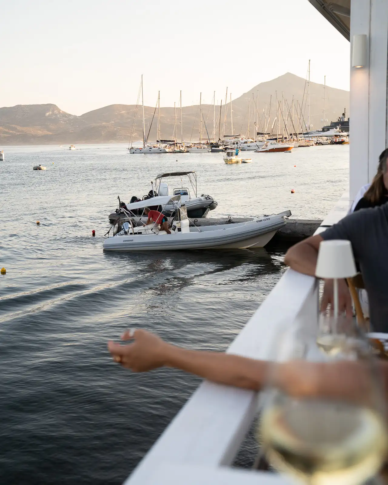 nostos seafood experience at sunset, in adamantas-milos, greece