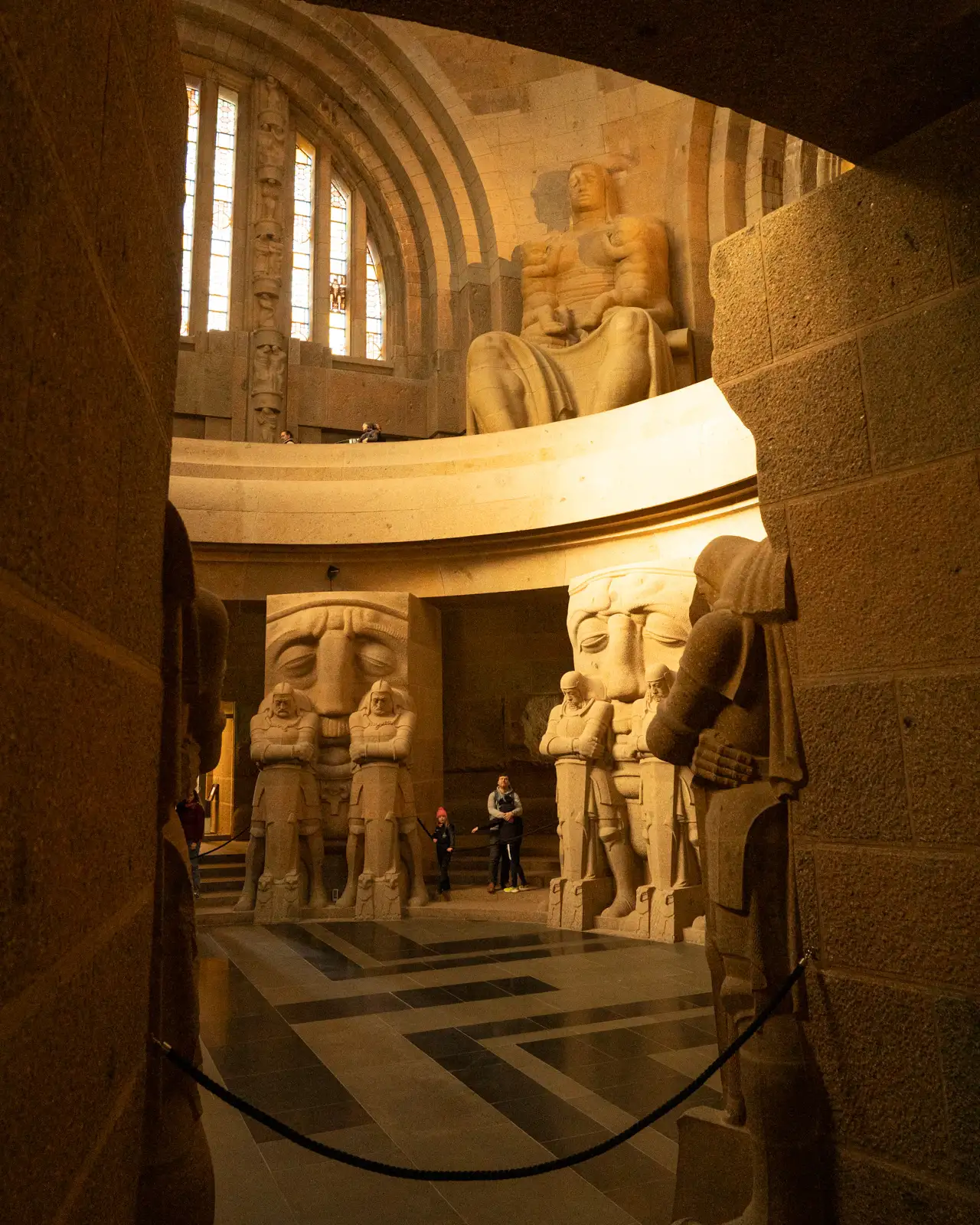 statues in the lower chamber of the battle of nations monument in leipzig, germany
