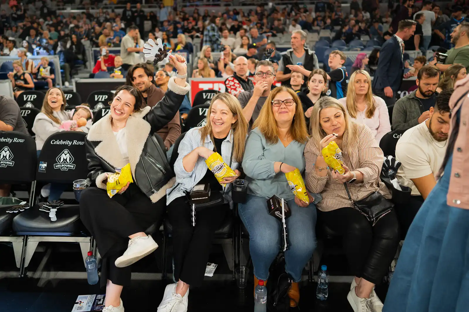 melbourne united fans cheering and having fun at john cain arena