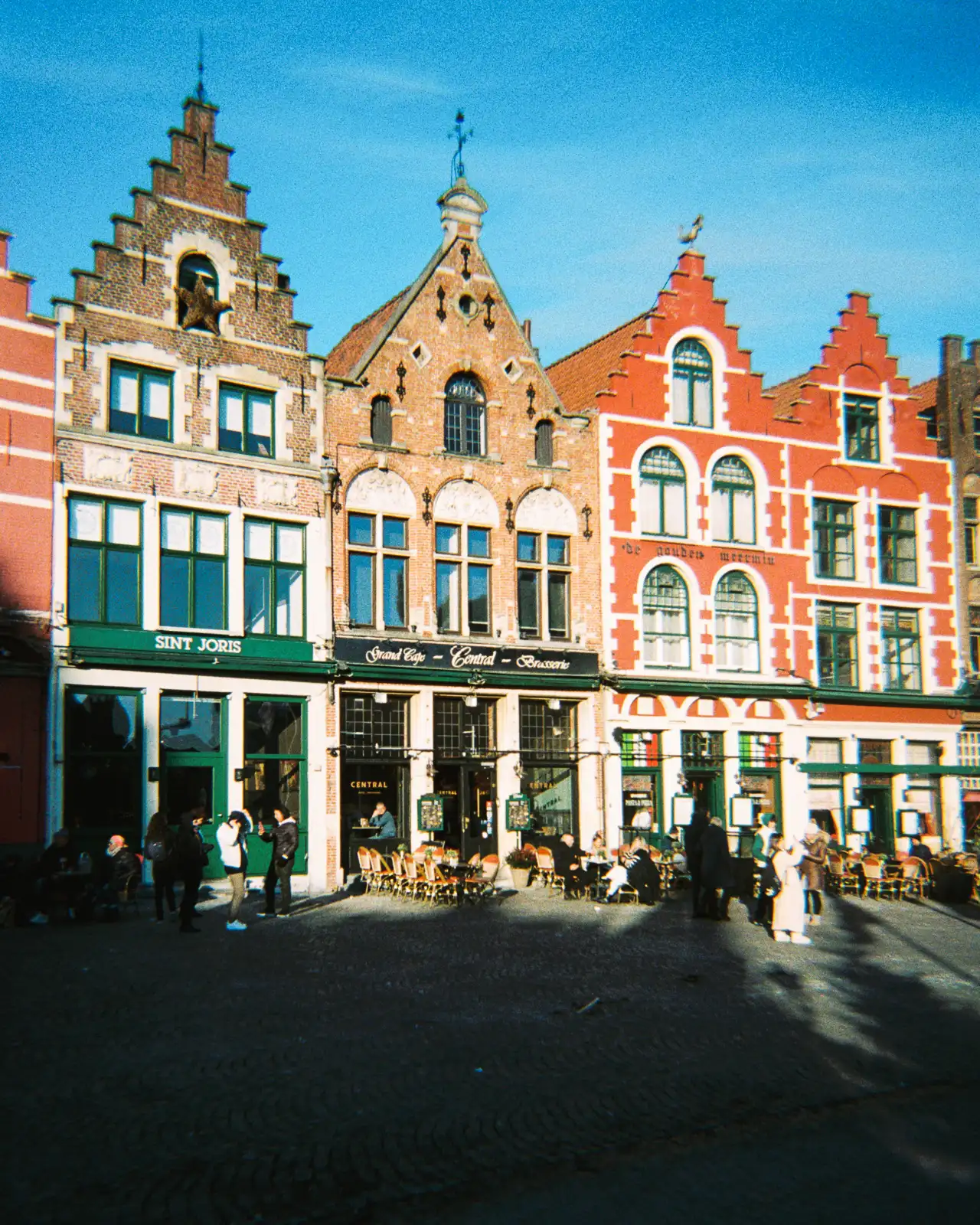 colourful unesco listed store fronts in bruges, belgium