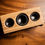 Thumbnail: Wooden speaker with three black speakers, BK3.050 (Zebrawood Wood) on wooden table background