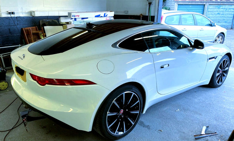 Side of white car with tinted windows 3_edited.jpg