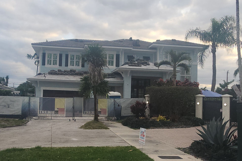 Street view of custom home design build nearing completion