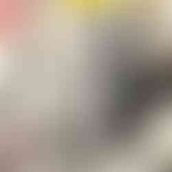 collage of ripped paper portrait of anthony bourdain