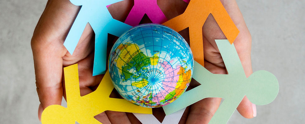 top-view-origami-chain-people-with-globe.jpg