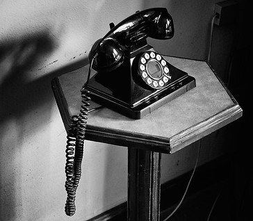 Rotary phone on hallway table