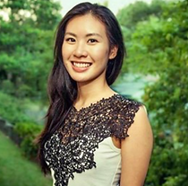 Headshot of psychologist Lily smiling