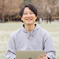 事業マネージャーの手塚