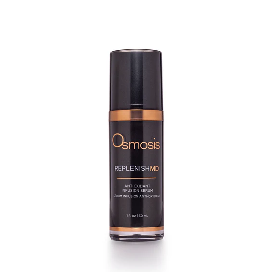 A small brown bottle of soothing botanical oil surrounded by dried lavender stems.