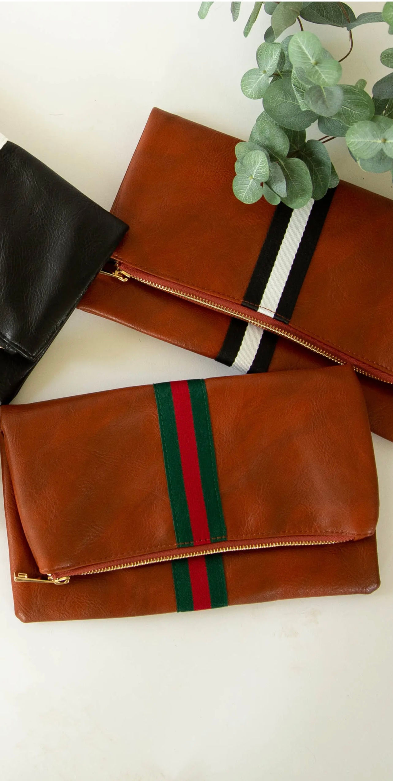 Fold over clutch with red s d green stripe 