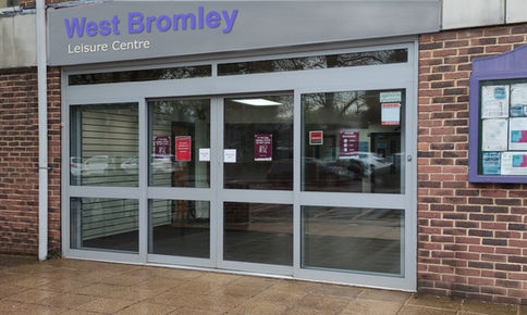 Commercial, aluminium sliding doors fitted to a leisure centre. ADI Portsmouth.