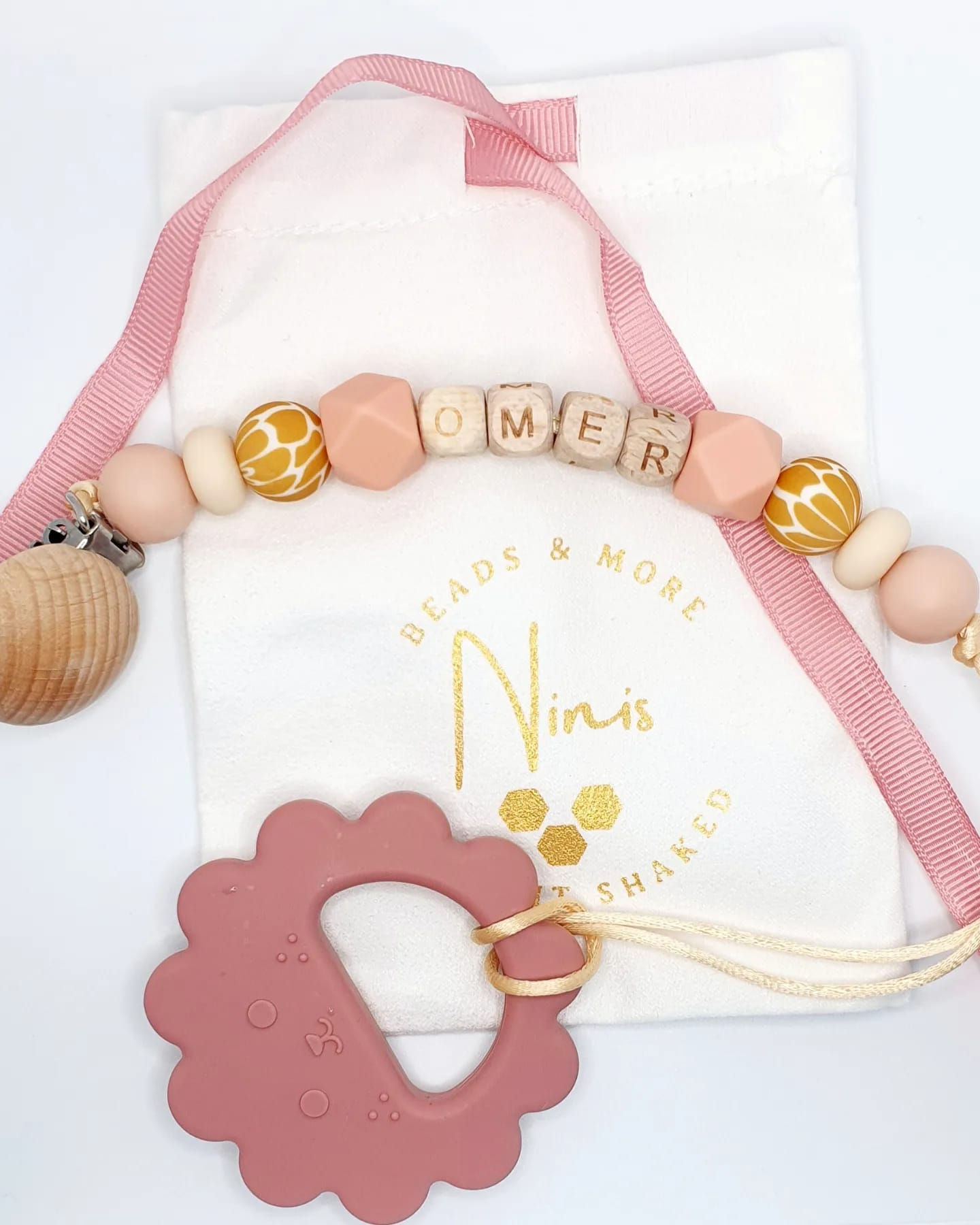 מחזיקמוצץ/נשכן עומר