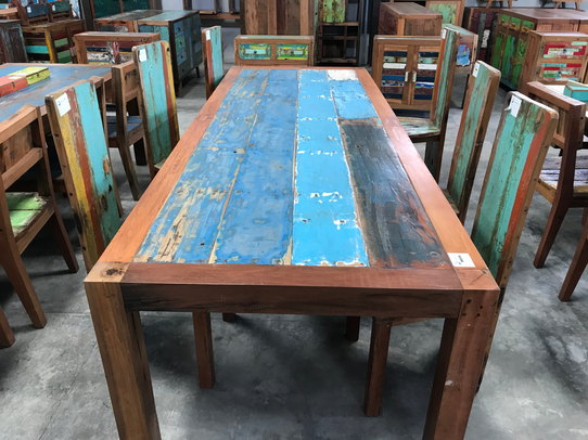 Reclaimed boat wood dining table handcrafted in Indonesia
