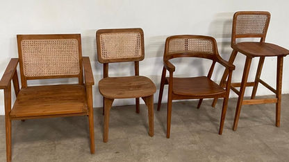 Teak dining chairs with rattan back rests