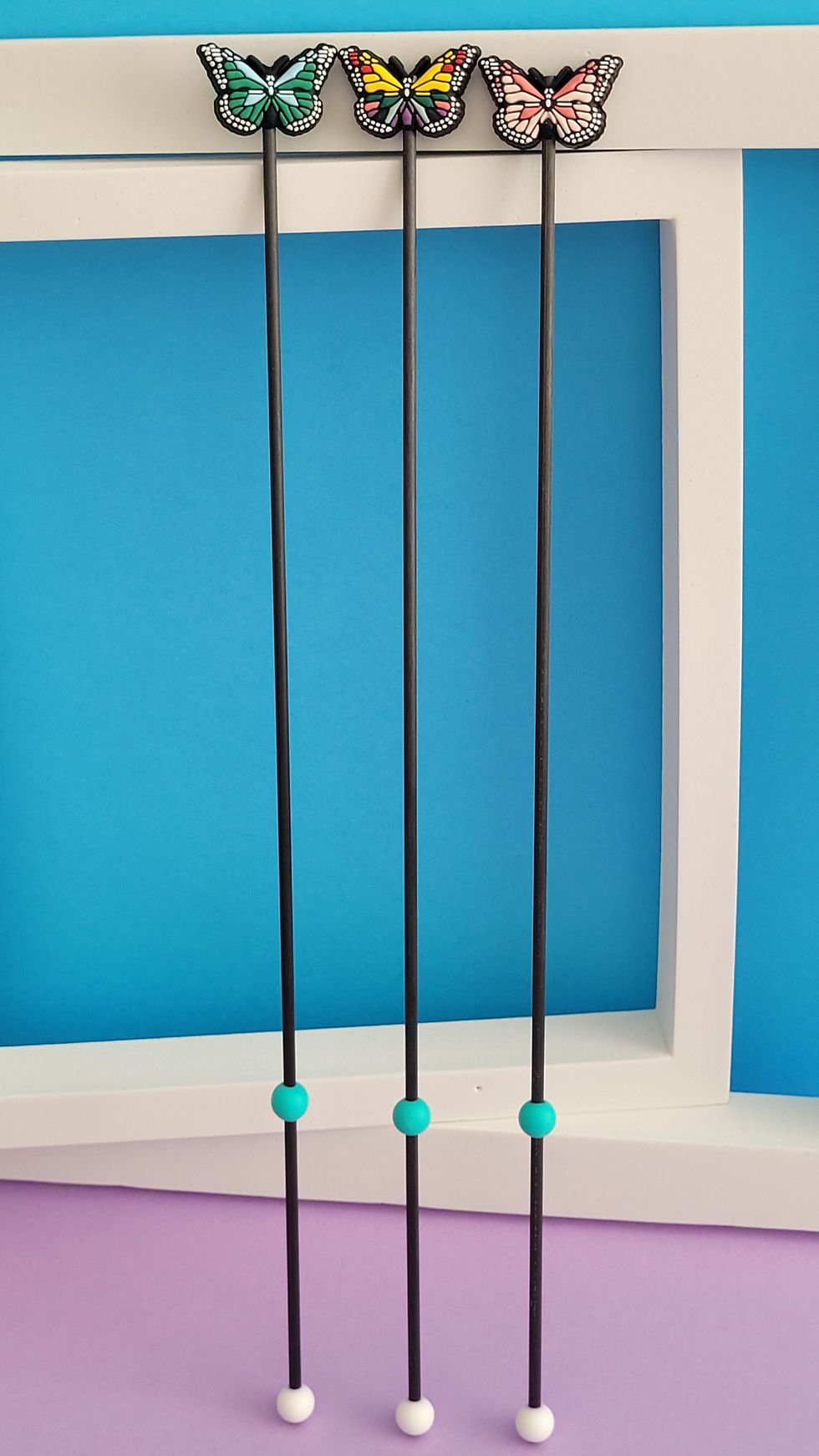 Miniature : Point de fixation Papillon