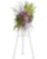 funeral standing spray with green pink and lavender flowers