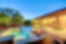 backyard area with a pool in a house in Mountains' Edge in Las Vegas, NV