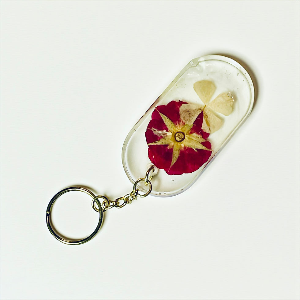 Thumbnail: Red Flower Accent Oval Four Leaf Clover Keychain