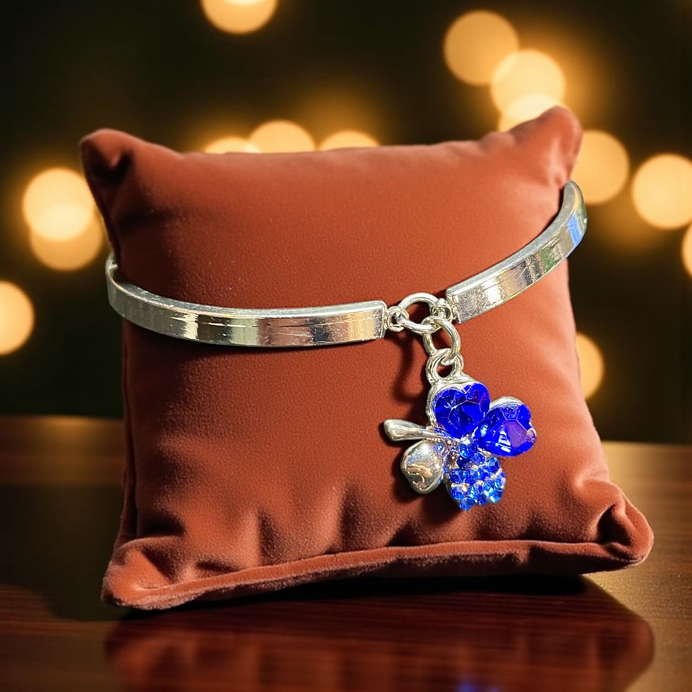 Thumbnail: Silver semi bangle bracelet with Royal Blue Four Leaf Clover Charm