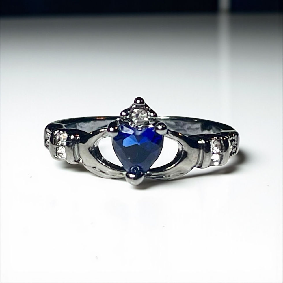 Thumbnail: Black/Dark Silver Metal with Blue Stone Claddagh with Cubic Zirconia Detail