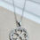 Thumbnail: Silver Rhinestone Halo Shamrock Necklace
