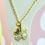 Thumbnail: Gold Pearly & White Rhinestone Four Leaf Clover Necklace