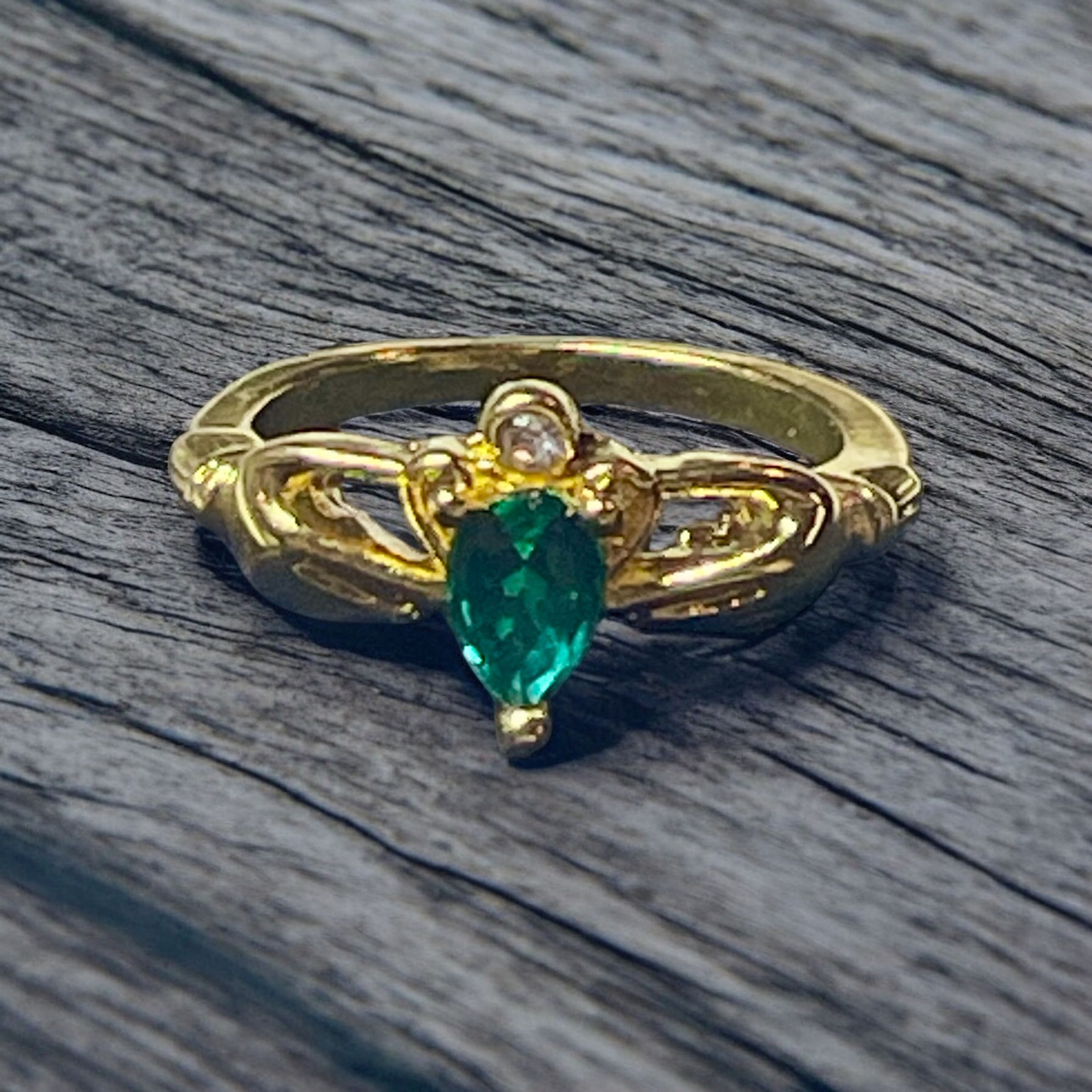 Golden Claddagh Ring with Emerald Green Stone & Cubic Zirconia Accent