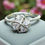 Thumbnail: Small Silver Rhinestone Four Leaf Clover Fidget Spinner Ring