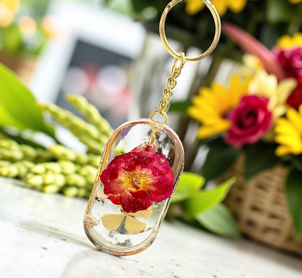 Thumbnail: Red Flower Accent Oval Four Leaf Clover Keychain